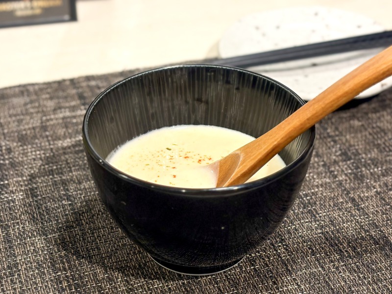 肉割烹 心のお通し（新じゃがと生姜のスープ）